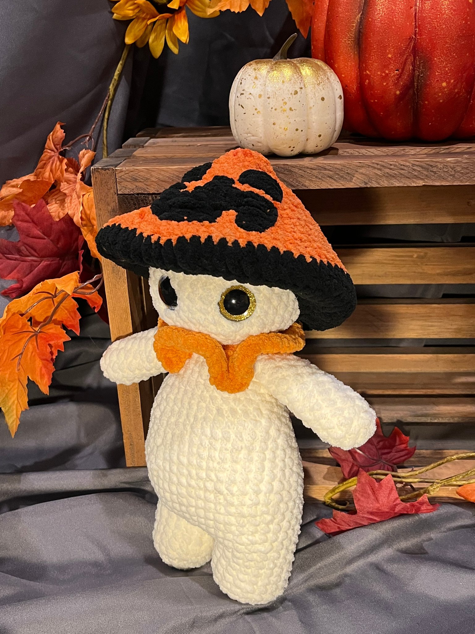 Handcrafted pumpkin colored mushroom plushie